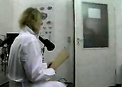 some other couple of ancient amateur Hungarian exotic dancers. This time they play doctor and patient. 
 Hmmmmmm... very hot.