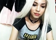 Pretty young shemale flaunts her lovely cock and juicy ass