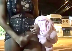 Shemale jerks her big cock in public and cums