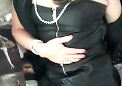 Candice in dark-hued vinyle