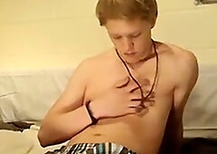 Kinky young man strips down and jerks off on camera in a solo cum show