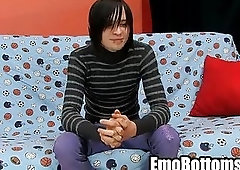 A hot punky twink is jerking his big cock off