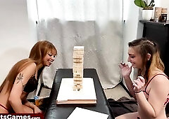 Enjoying a sex-toy from her slim lesbo ally