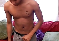 Jock takes his big black cock out to jerk off