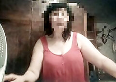 Curvy milf stepmom with fat natural melons secretly video calls her stepson while ironing clothes