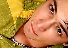 Slut stares at the camera in gay porn vid