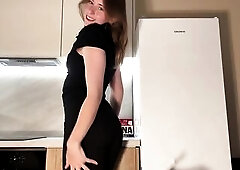 I stood in the kitchen wearing a sharp ebony office pantsuit and elegant white heels like a wicked little business pixie, spinning lazily and posing t