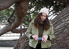 Young Brunette Is Taking An Unhurried Stroll With Allwhite 120mm Cigarette