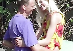 Blonde bombshell enjoys intimate outdoor dildo session