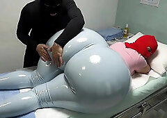 Intensive erotic massage on a woman with a MEGA massive booty wearing shiny light blue leggings and a super thin light blue strap. This babe's ly