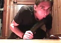 Guy eats liquid from his open ass