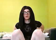 Young trans rides a big dildo