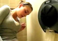 Lovely girl went to a public toilet and started rubbing her pussy until she had an orgasm