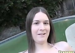 Seductive trans babe masturbates by the pool