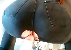 Kinky Sissy in taut denim gets cream on her bootie