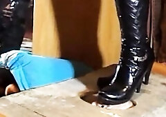 dominant-bitch fearlessly tramples her serf on his feet in ebony heeled boots