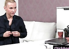 Casting angel stimulates agents clitoris with sex tool on desk