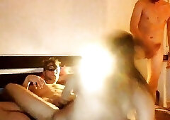 Naked shemale smokes in a homemade video with two guys