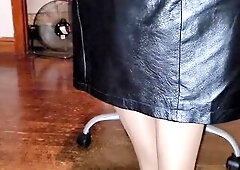 Lengthy ebony lined leather petticoat with a silky lining and shiny glossy hose. Garments fetish