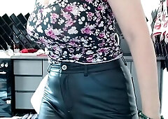 That babe gracefully walked along the kitchen floor and showed her large butt in leather panties, then began to take 'em off her booty and fondle