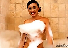 Gorgeous tranny Venus Luxxx sensually shaves her big cock and adorable tight ass before an erotic handjob in the bathtub