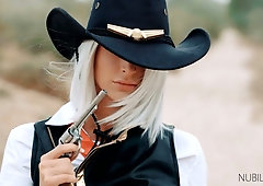 Gorgeous blond cowgirl Emma Hixgets her pussy nailed on the prairie