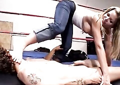 A seductive blond mother I'd like to fuck takes control in a wrestling ring, fingering herself previous to riding her partner to ecstasy in inten