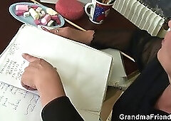 Very old teacher is pounded by two boys