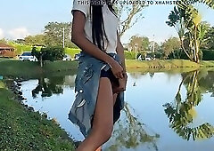 Laura pissing in the lake in public