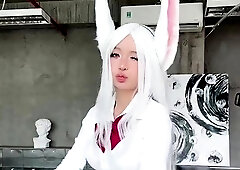 Cosplay cutie posing and playing with herself on webcam