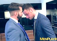 Elevator sex for a pair of businessmen in expensive suits
