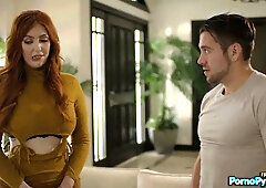 Curvy redhead Lauren Phillips enjoys oral from her man on the white couch
