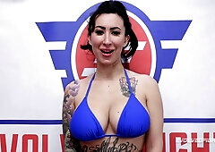 Wrestling mat showdown as Dan Ferrari face-fucks tattooed Lily Lane