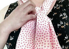 Crossdresser playing with her fresh costume.