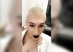 Hot femboy in latex and heels shows off his pretty shining body