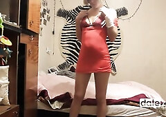 Datezone.com - Short-haired blond in a taut red costume masturbates her twat