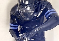 Latex-clad drone shoots his load inside his rubber sock