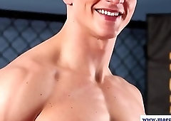 Muscular stud stroking his hard cut dick