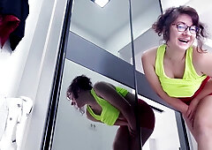 Woman finds unexpected release while touching herself in a dressing room