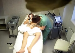 Spy camera captures laser hair removal session on teen pussy