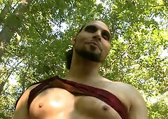 Blonde dominatrix binds and controls her muscular captive in a sunlit forest ritual