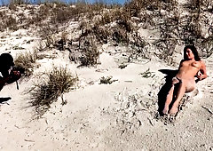 Sexy slender brunette flaunts her amazing body on the beach