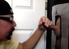 Assfucked DILF sucks gloryhole cock