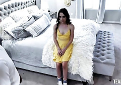 Cute doll Lily Glee looks great in the cowgirl pose in the bed