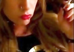 Tranny skank teases horny perverts while smoking a cigarette solo