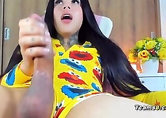 Latina shemale stroking her big, firm cock