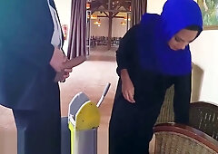 Young Arab woman in hijab accepts cash from boss before mounting him on the office bed