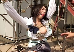 Helpless Asian milf with big tits enjoys pain and pleasure