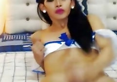 Skinny Asian ladyboy strokes her cock for her webcam fans
