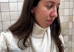 Katty West takes on a deep throat casting challenge in a mall bathroom